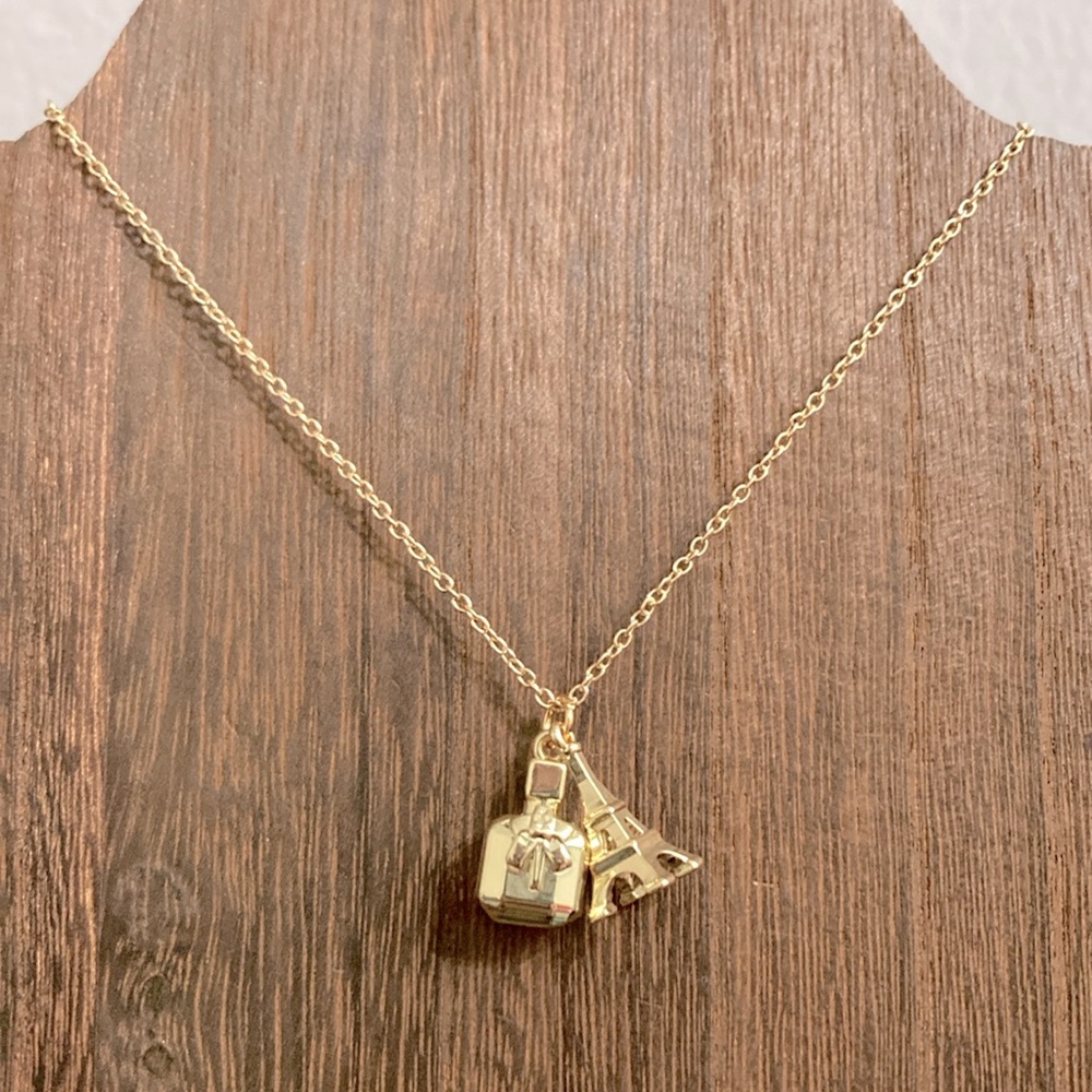 Yves Saint Laurent Gold Eiffel Tower and Perfume Bottle Necklace - Picture 2 of 5